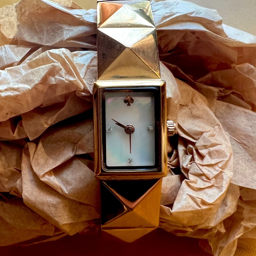 Kate Spade rose gold studded watch with mother of pearl face